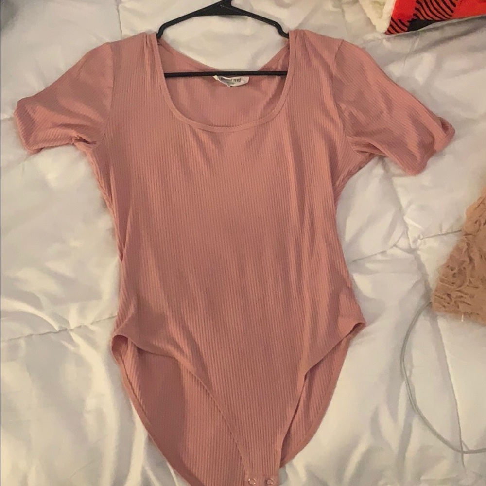 Light pink body suit